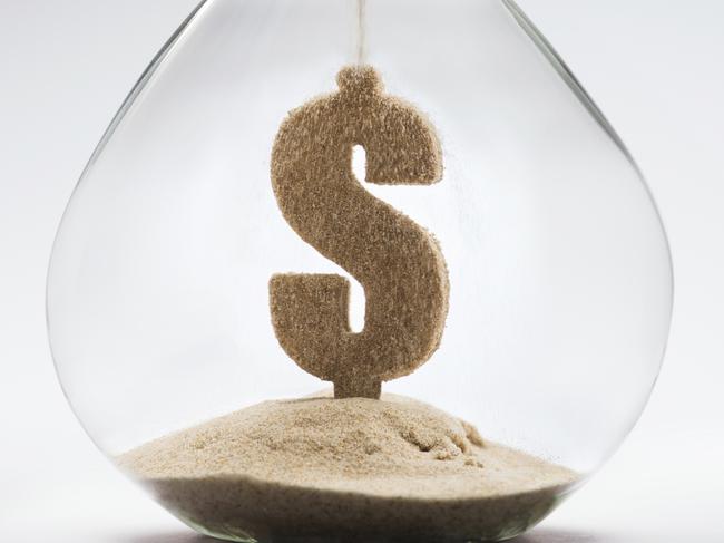 Moneysaver Time is money concept with falling sand taking the shape of a dollar, tax, money, time