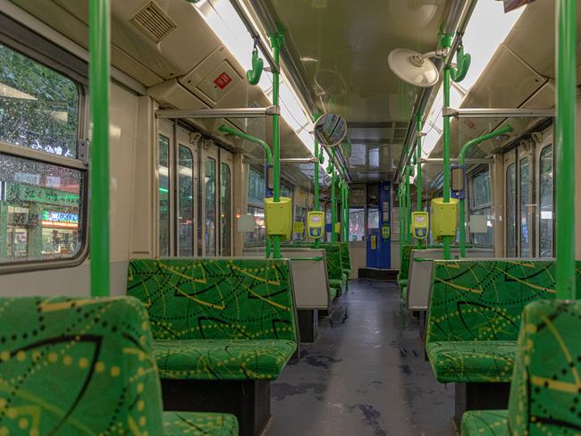 An empty tram travels down Swanston street in Melbourne. Picture: Getty