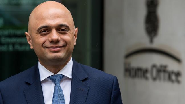 Home Secretary Sajid Javid greets the press in London. Photo: Getty Images