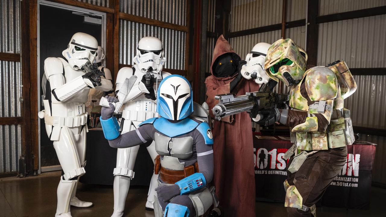 Members of the 501st Legion (from left) Scott Gray (Stormtrooper), Aaron Reis (Stormtrooper), Courtney Shadbolt (Bo-Katan), Jess Reis (Jawa) and Luke Shadbolt (Scout trooper) Comic-Geddon at The Goods Shed. Picture: Kevin Farmer