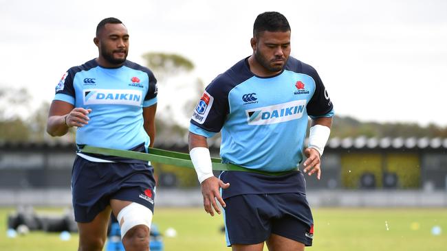 Tolu Latu (right) has been booted out of the Wallabies’ training camp. Picture: AAP