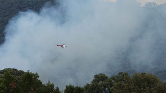 200 firefighters and helicopter crews responded to the incident. Picture: Jason Edwards