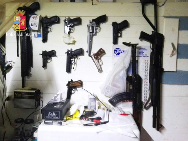 Arms found by Italian police during an anti-mafia operation. Police nabbed two fugitive mobster bosses after discovering them "living like animals" in a mountain hideout. Source: AFP