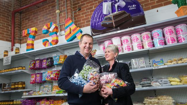 ‘We lost half to three-quarters of our retail’: Peter and Michelle Stapelfeldt of Wallies Lollies in Melbourne’s Box Hill South. Picture: Paul Jeffers