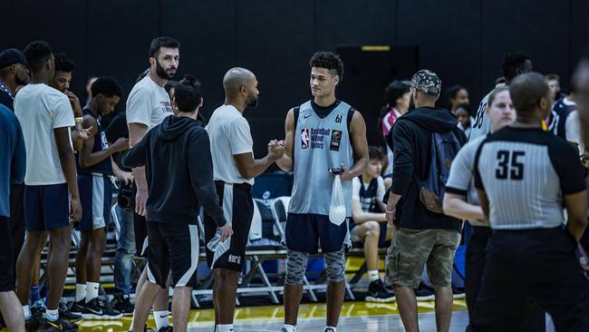 Josh Green speaks with Derek Fisher. Photo credit: NBA Academy