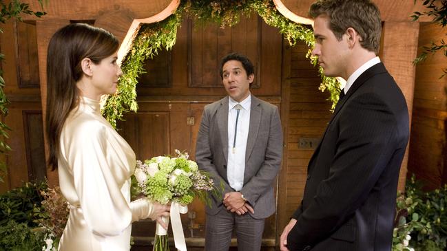 With Sandra Bullock and Oscar Nunez in the 2009 rom-com The Proposal. Picture: Supplied