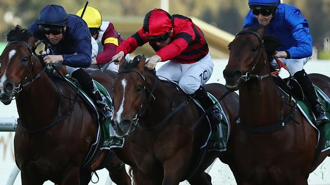 SYDNEY, AUSTRALIA - SEPTEMBER 14: Zac Lloyd riding Traffic Warden wins Race 8 James Squire Run To The Rose during Sydney Racing at Rosehill Gardens on September 14, 2024 in Sydney, Australia. (Photo by Jeremy Ng/Getty Images)