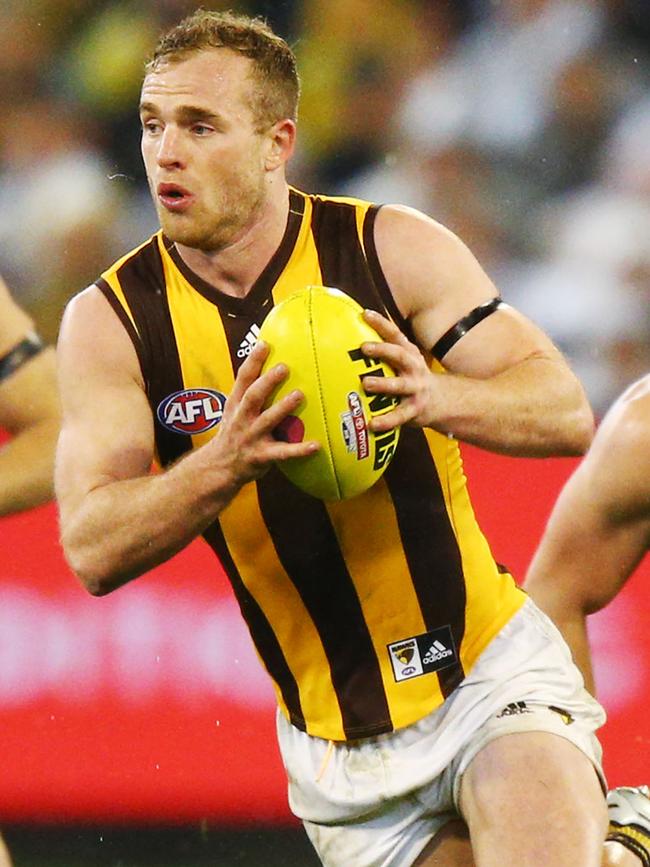 Tom Mitchell in action against Hawthorn.