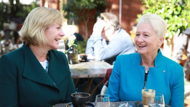 Independents Zali Steggall, left, and Kerryn Phelps catch up over coffee.