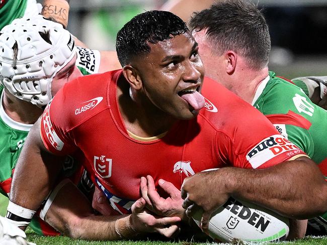 BRISBANE, AUSTRALIA - JULY 11: Tevita Pangai Junior of the Dolphins celebrates after scoring a try during the round 19 NRL match between Dolphins and South Sydney Rabbitohs at Kayo Stadium, on July 11, 2024, in Brisbane, Australia. (Photo by Bradley Kanaris/Getty Images)