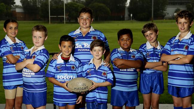 Katlyn Clarke (far left) with her team mates at Mascot Junior Rugby League club in 2015. Picture: John Appleyard