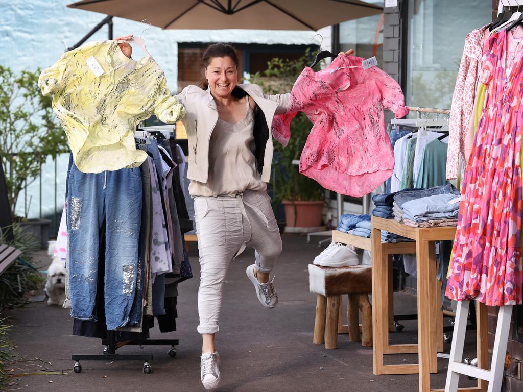 Esmeralda Petrov, owner of Ooshka Fashion Boutique in Kew, is thrilled to be open again. She’s trading outside, in line with government regulations. Picture: David Caird