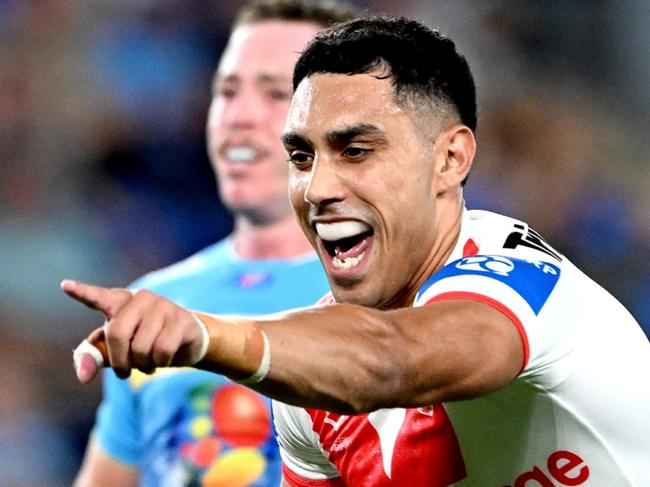 GOLD COAST, AUSTRALIA - MARCH 09: Tyrell Sloan of the Dragons celebrates after scoring a try during the round one NRL match between the Gold Coast Titans and St George Illawarra Dragons at Cbus Super Stadium, on March 09, 2024, in Gold Coast, Australia. (Photo by Bradley Kanaris/Getty Images)