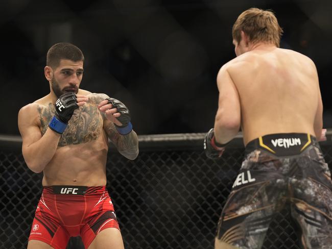 LAS VEGAS, NV - DECEMBER 10: (R-L) Bryce Mitchell battles Ilia Topuria in their Featherweight fight during the UFC 282 event at T-Mobile Arena on December 10, 2022 in Las Vegas, Nevada, United States. (Photo by Louis Grasse/PxImages/Icon Sportswire via Getty Images)