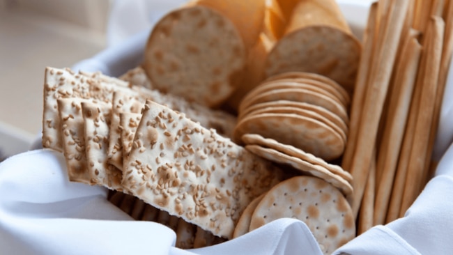 Replace refined crackers with whole-grain options for added fibre, keeping you fuller and aiding digestion. Image: iStock