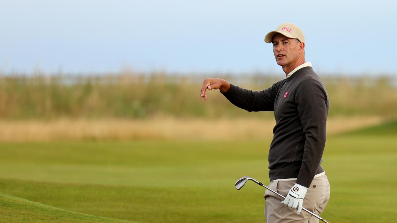 TROON, SCOTLAND - JULY 18: Adam Scott of Australia reacts after holing his bunker shot for a birdie on the first hole on day one of The 152nd Open championship at Royal Troon on July 18, 2024 in Troon, Scotland. (Photo by Andrew Redington/Getty Images)