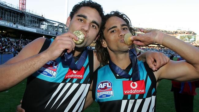 Shaun Burgoyne and Peter Burgoyne after the 2004 premiership. Picture: Getty Images