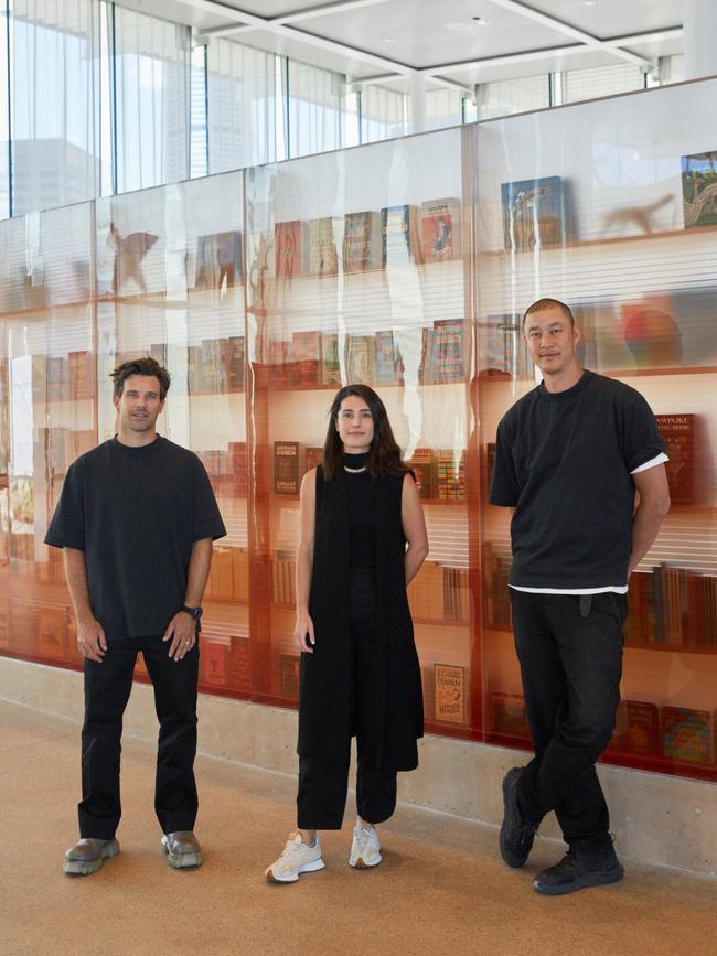 Multi-disciplinary designer Hayden Cox, left, Akin Atelier associate Alexandra Holman and Kelvin Ho outside The Art Gallery of NSW’s Sydney Modern building Gallery Shop. Picture: Tim Salisbury