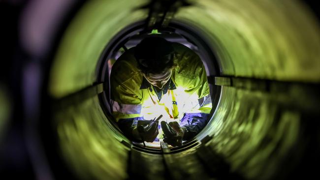 An ASC worker works on a Collins-class submarine. Picture: Defence