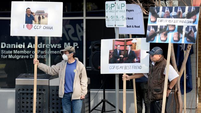 Protesters outside Daniel Andrews’ electoral office voicing their concern about Victoria’s increased financial links with China and its communist regime. Picture: Andrew Henshaw