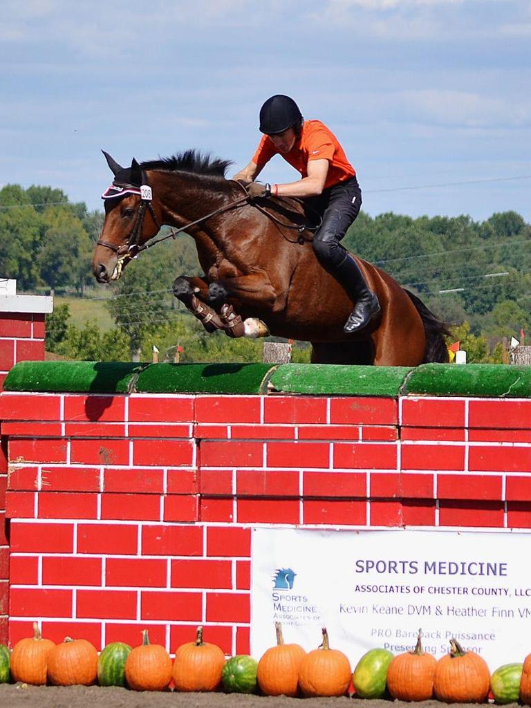 Willie McCarthy bareback jumping six feet one inch on a horse called I Bella.