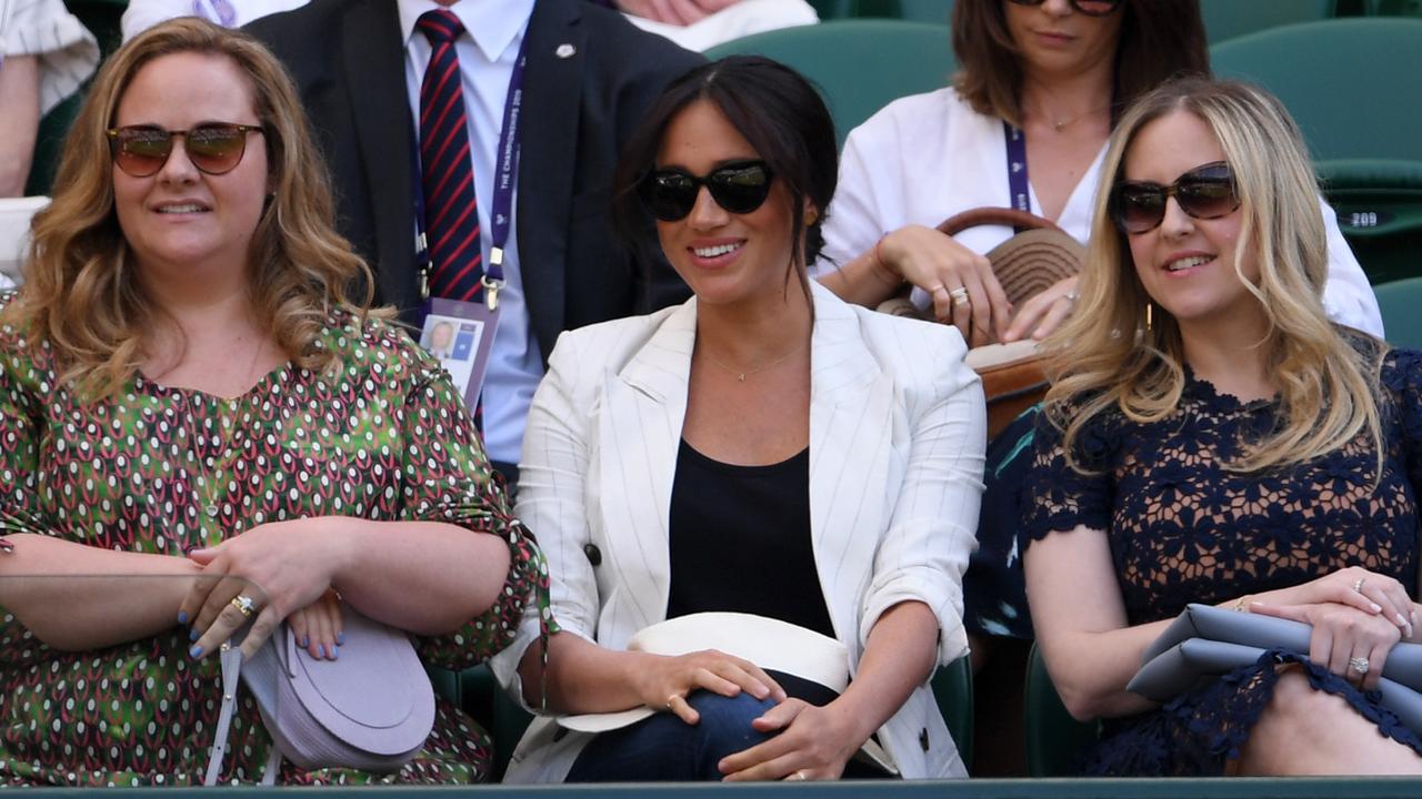 Meghan Markle accompanied by her friends at Wimbledon. Can you spot the Archie tribute? Picture: Laurence Griffiths/Getty Images