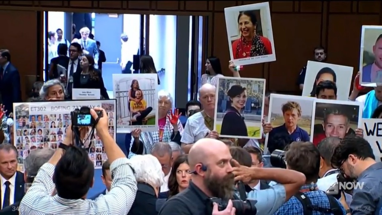 The families held up photos of their loved ones killed in both fatal crashes.