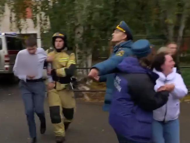 Screenshot of footage showing emergency services helping wounded after a gunman opened fire at a school in Izhevsk in Russia.