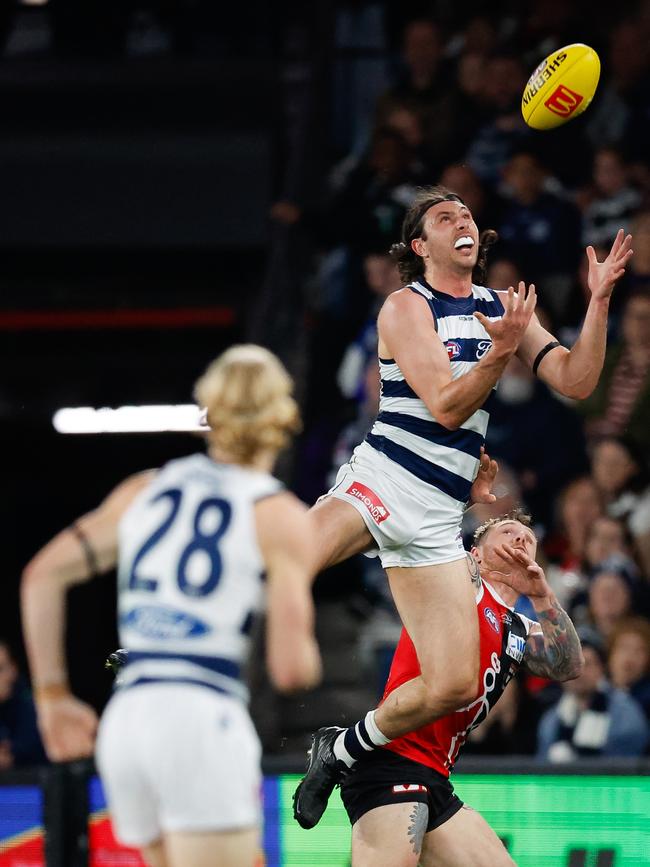 Jack Henry flies for an intercept mark. Picture: Dylan Burns/AFL Photos via Getty Images