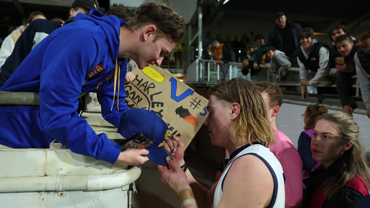 Harley Reid of Vic Country signs autographs in Perth. Picture: Paul Kane/AFL Photos/via Getty Images