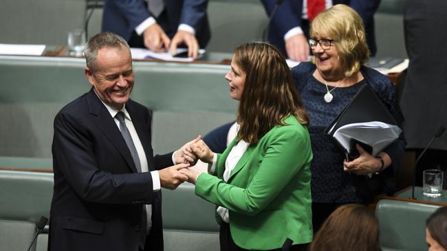 Labor backbencher Kate Ellis is congratulated by Bill Shorten after delivering her valedictory speech in the House of Representatives. Picture: AAP