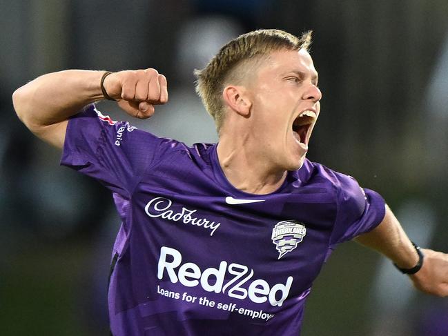 Nathan Ellis shows off his flex after taking a wicket for the Hobart Hurricanes.