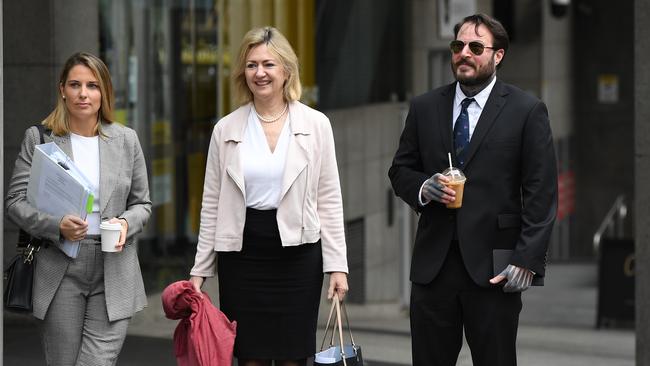 Howard Rollins (right) arrives at the Downing Centre District Court in Sydney with his solicitor Lauren MacDougall (left) and barrister Margaret Cunneen SC. Picture: AAP