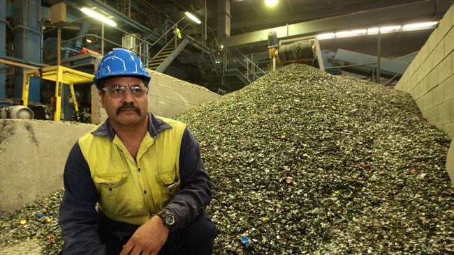 Gold Coast City Council Recycling depot at Carrara, Recycling plant operator Richard Rangiwai.