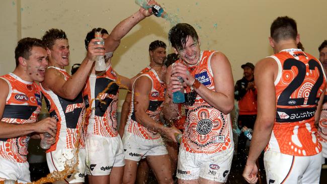 Debutant Sam Taylor gets the Gatorade shower as the Giants hit back in Adelaide. Pic: Getty Images