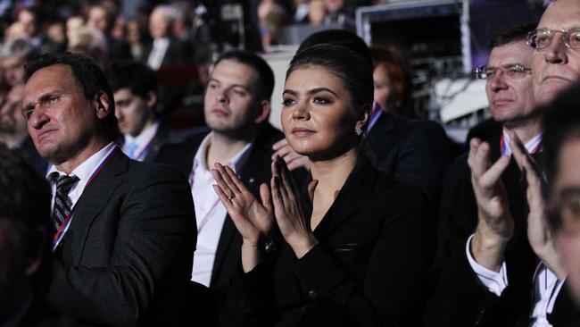 Alina Kabaeva applauding the speech of Vladimir Putin to the United Russia Party on November, 27, 2011 in Moscow. Mr Putin. prime minister at the time, was accepting the nomination to run again for president. Picture: Getty Images