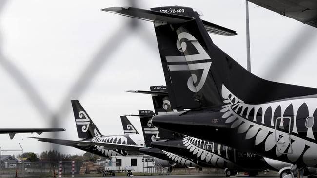 Air New Zealand planes sit idle on the tarmac at Christchurch Airport, New Zealand, last month. Picture: AP/MARK BAKER