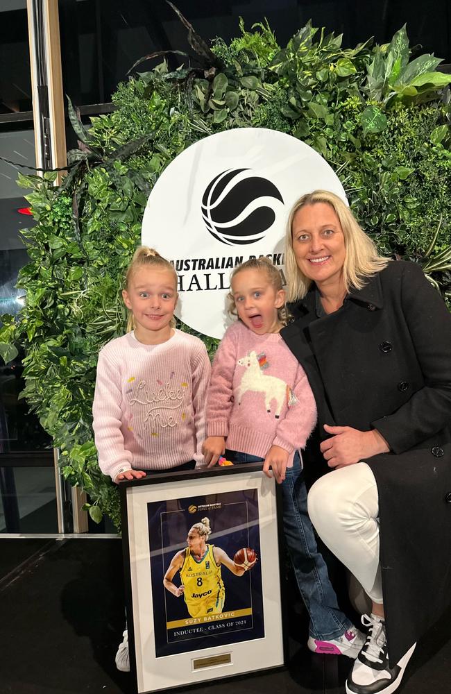 Hall of Fame Inductee Suzy Batkovic with twins Charli Ryder (left) and Layla Ryder.