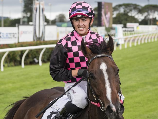 Jockey Ben Thompson and Rothfire return after winning the King of the Mountain for trainer Robert Heathcote at Clifford Park Racecourse, Monday, January 1, 2024. Picture: Kevin Farmer