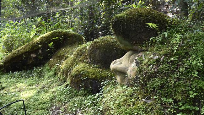 Jeanne Villani’s moss-covered garden sculpture.