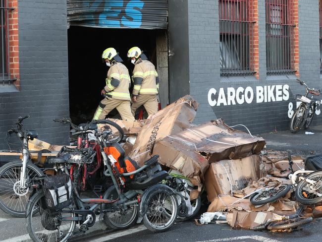 The offenders use a car to smash into the bike store. Picture: David Crosling