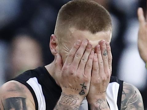 MELBOURNE, AUSTRALIA - JULY 04: Jordan De Goey of the Magpies reacts after missing a goal during the round 16 AFL match between Collingwood Magpies and St Kilda Saints at Melbourne Cricket Ground on July 04, 2021 in Melbourne, Australia. (Photo by Darrian Traynor/Getty Images)