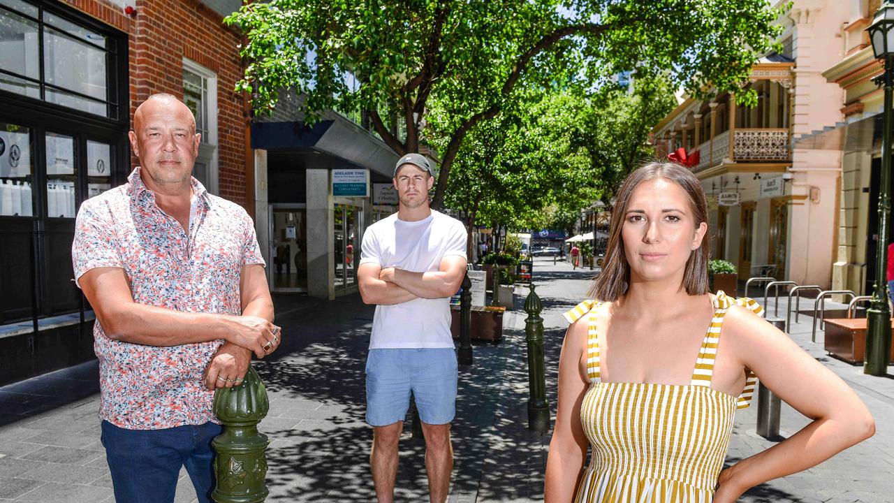 Restauranteur Simon Kardachi, left, with Max and Laura Sharrad in Leigh St where their restaurant Figazzi has closed due to crippling Covid regulations. Picture: Brenton Edwards