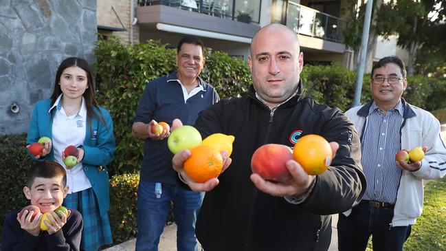 Eddy Sarkis (front) with his children Freddy and Lamissa Sarkis, and David Isaac and Val Moran at Pemulwuy. Picture: Angelo Velardo