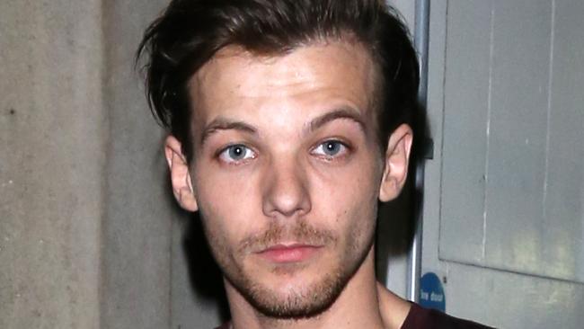 Louis Tomlinson at Libertines in London Pictured: Louis Tomlinson Ref: SPL1195914 131215 Picture by: Splash News Splash News and Pictures Los Angeles: 310-821-2666 New York: 212-619-2666 London: 870-934-2666 photodesk@splashnews.com