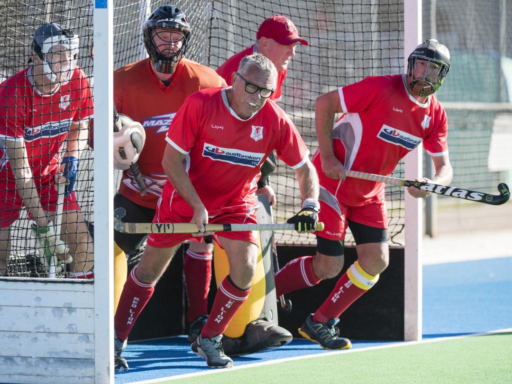 Scott Downs (front) as Red Lion White defend a corner from Newtown in A4 men Presidents Cup hockey at Clyde Park, Saturday, May 27, 2023. Picture: Kevin Farmer