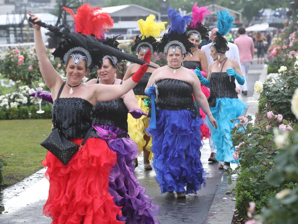 Racegoers are seen at the end of the Lexus Melbourne Cup Day, as part of the Melbourne Cup Carnival, at Flemington Racecourse in Melbourne, Tuesday, November 6, 2018. (AAP Image/Dave Crosling) NO ARCHIVING, EDITORIAL USE ONLY