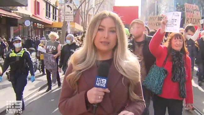 Channel 9 reporter Lana Murphy reporting from a pro-choice rally in Melbourne on Saturday, July 2, 2022. Source: Nine News