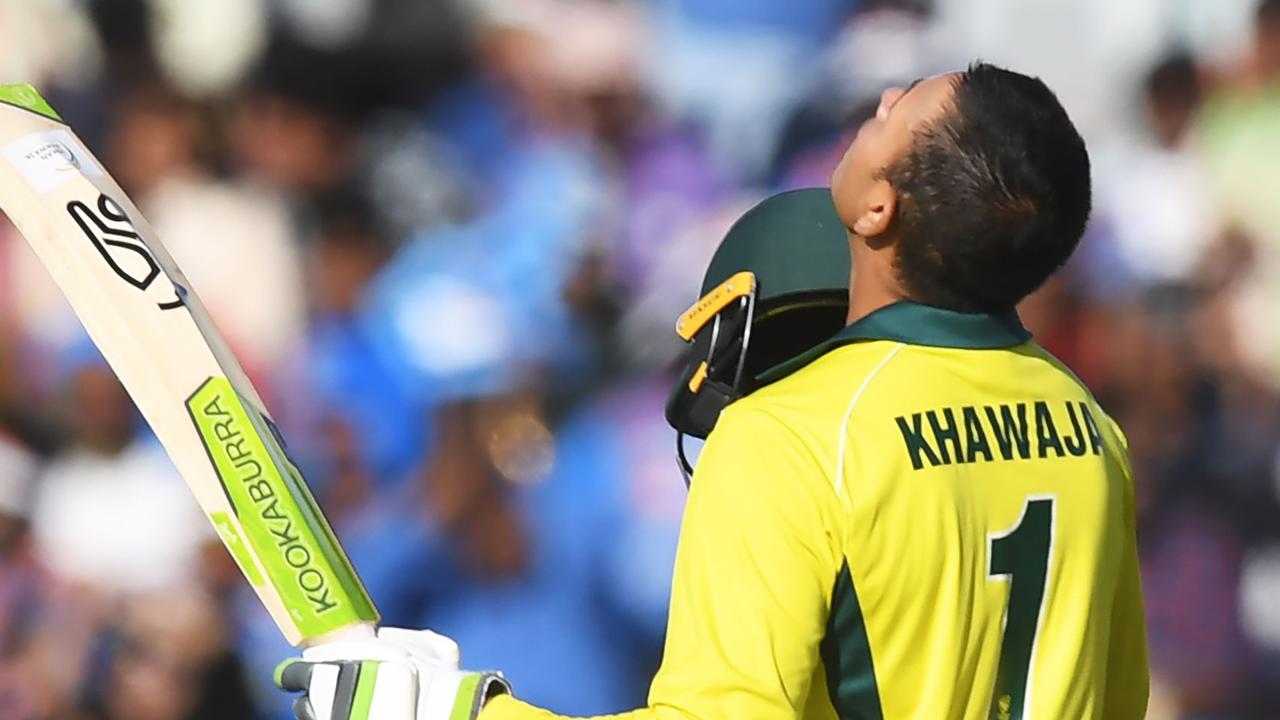 Australia batsman Usman Khawaja celebrates a maiden one-day century against India at the Jharkhand State Cricket Association International Cricket Stadium, Ranchi. Picture: AFP