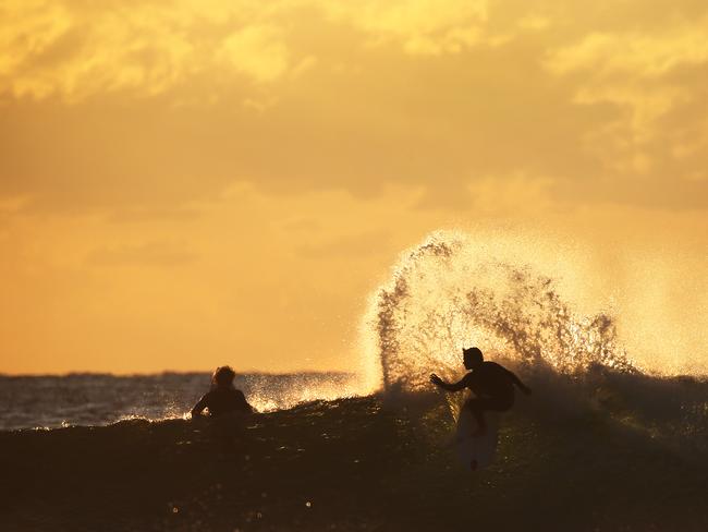 Surfers at Lennox Head / Picture: Dylan Robinson